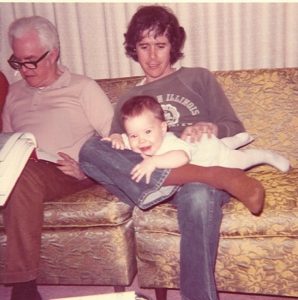 Left to right: My grandfather, My dad, Some Random Baby (me), Ugliest Couch Ever